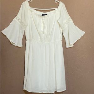 White dress with bell bottom sleeve